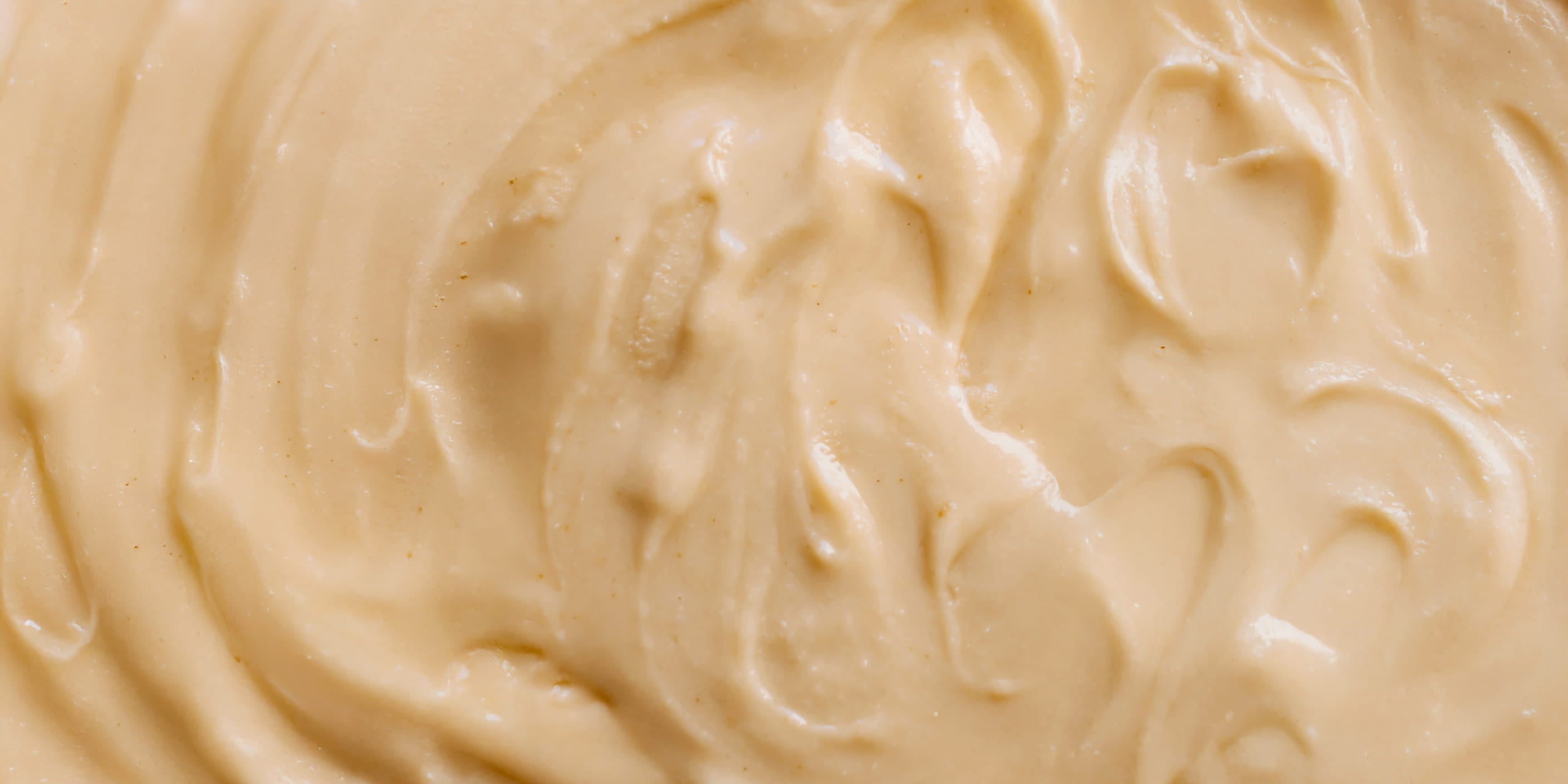 Silky macadamia nut butter—crafted with simple ingredients, rich in monounsaturated fats, and perfect for energy, gut health, and everyday nutrition.
