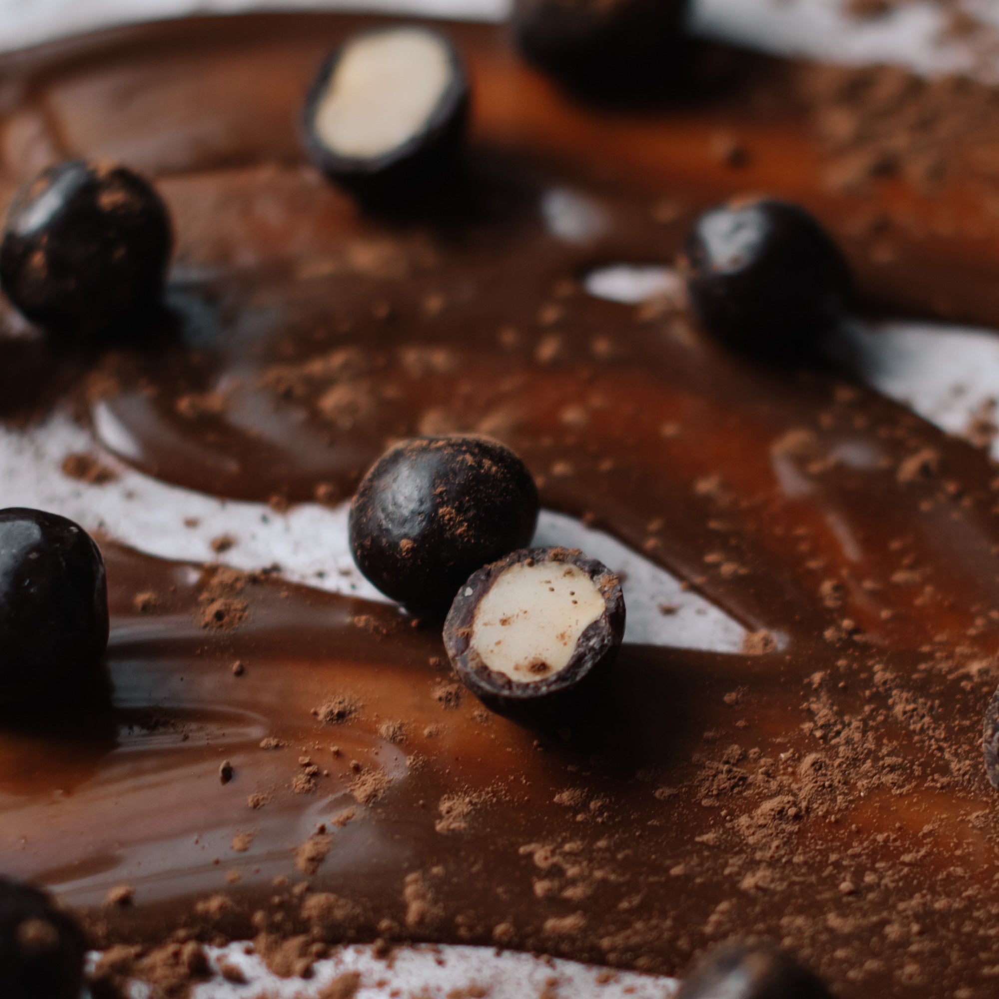 House of Macadamias Chocolate Covered Macadamia Nuts — a vegan, plant-based, nutrient-dense snack rich in healthy monounsaturated fats and antioxidants; a guilt-free sweet treat perfect for clean eating, keto-friendly, and natural energy boost
