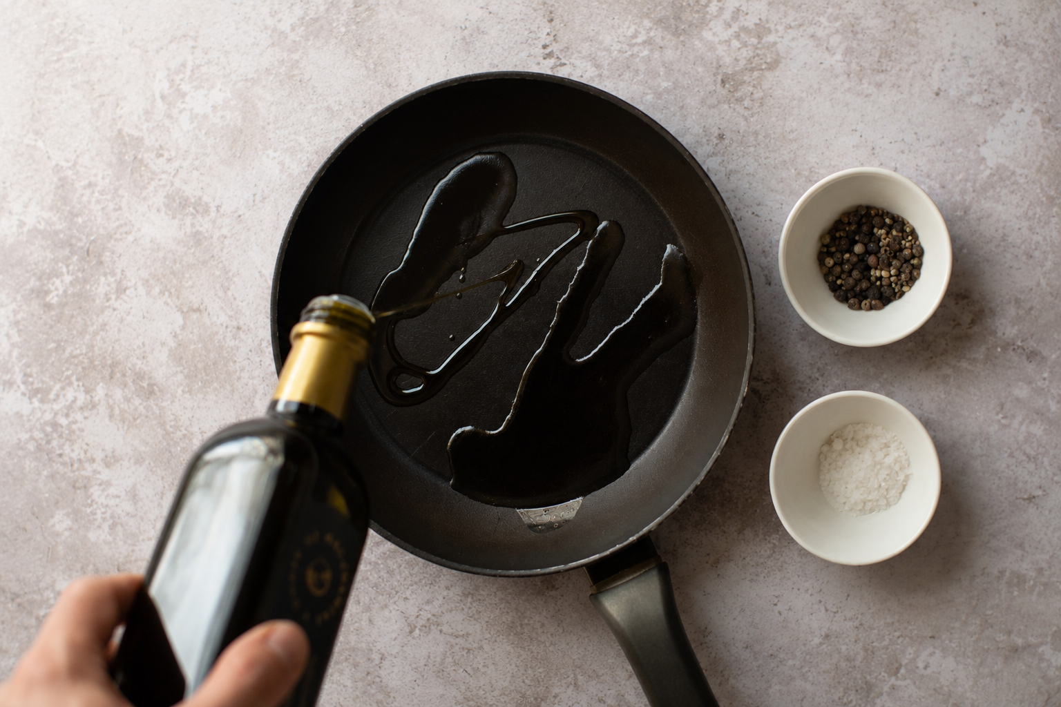 macadamia oil drizzled in pan