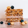 Blueberry macadamia snack bar by House of Macadamias, made with macadamias as the first ingredient. Plant based, no seed oils, 100% natural healthy snack bar rich in antioxidants and healthy fats.