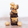Chocolate macadamia snack bar by House of Macadamias, made with macadamias as the first ingredient. Plant based, no seed oils, 100% natural healthy snack bar rich in antioxidants and healthy fats.