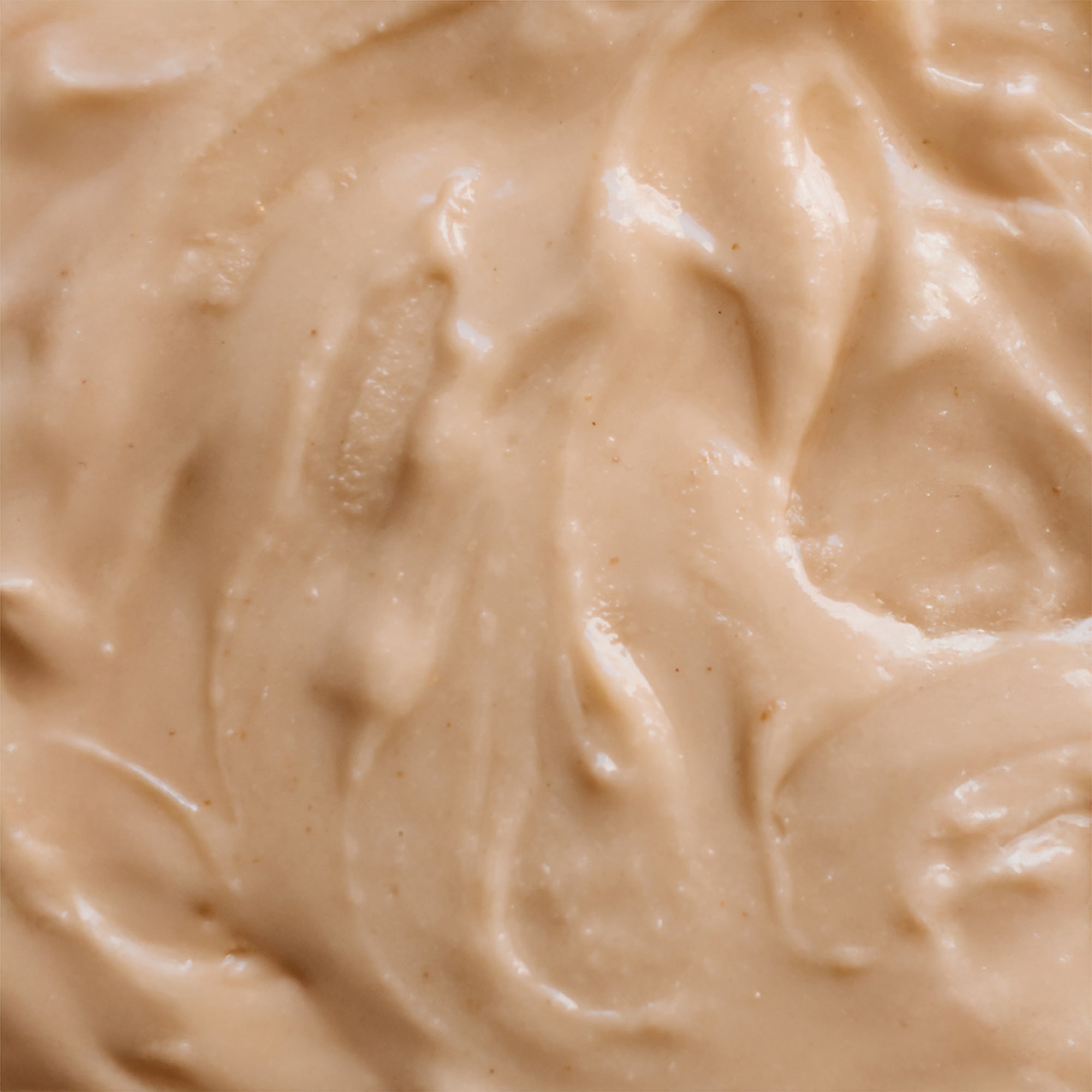 Sea Salt Macadamia Nut Butter smeared close-up showing creamy texture and sea salt crystals